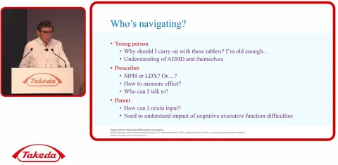 Peter Hill accompanied by a slide explaining navigating ADHD into adulthood